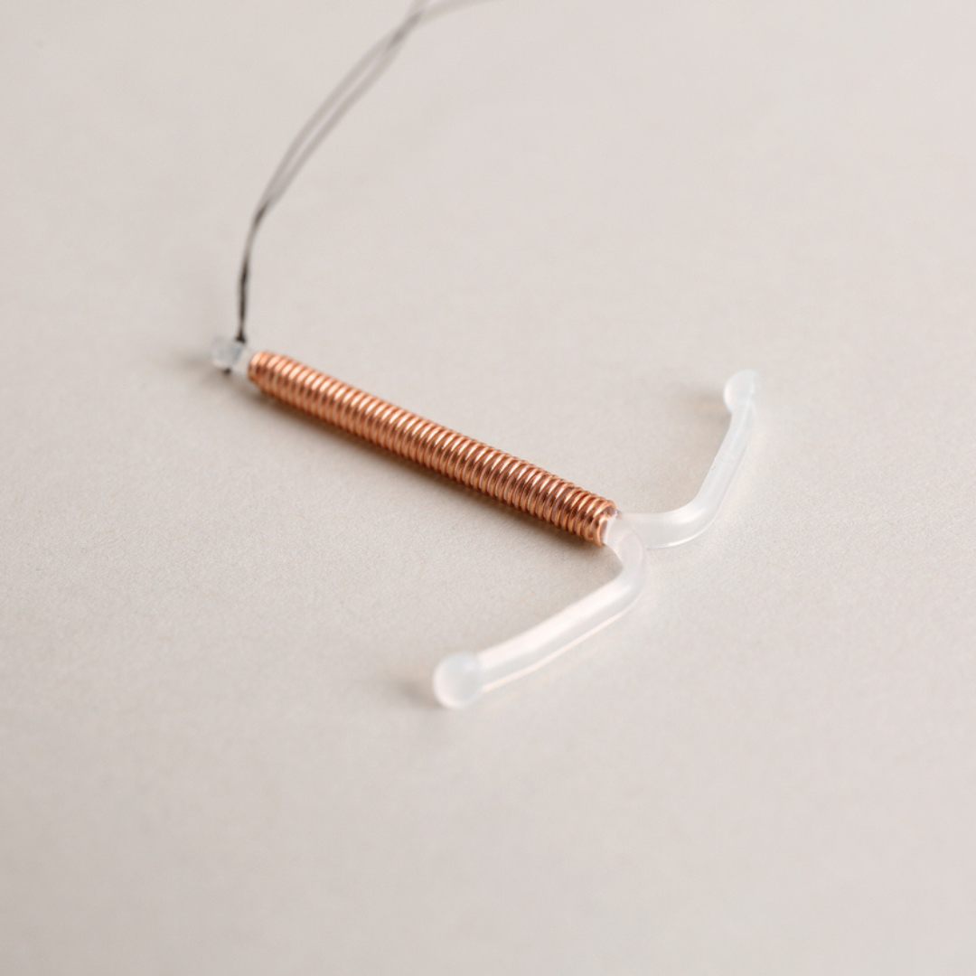 IUD on a light gray background